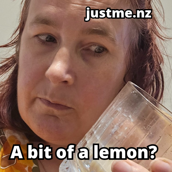 Kitty looking at a scented candle