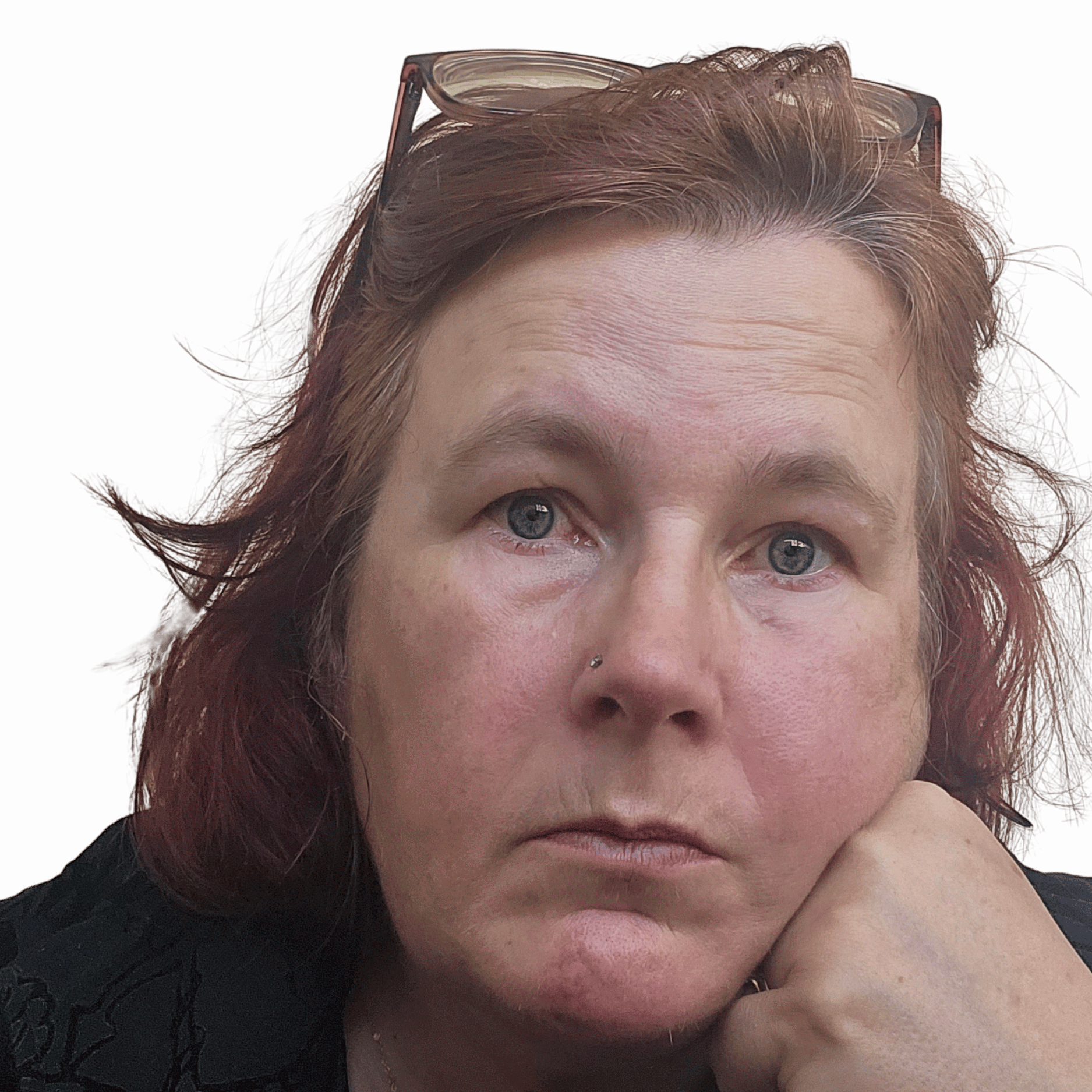 image of kitty fitton staring with blank expression into the camera.